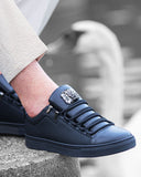 Trendy black sneakers with laces and Lion metal badge and black sole for men