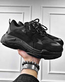 Black sneakers shoes with black soles and stylish chunky shape for men