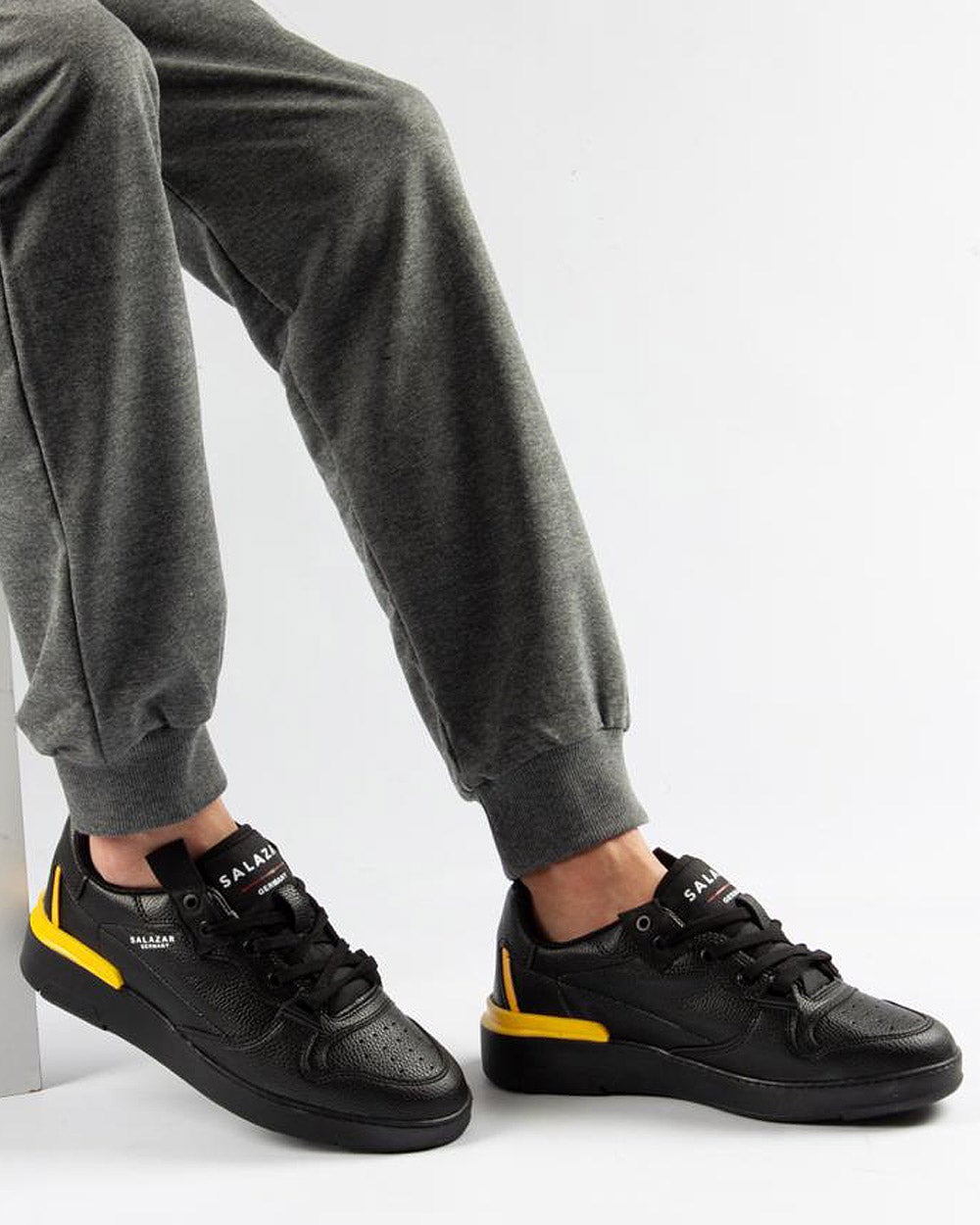 Shoes Black Trendy two-tone black yellow sneakers for men with black sole