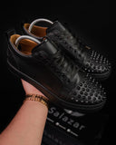 BB Salazar men's black leather-look low-top sneakers with trendy studs