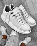 Chaussures sneakers Blanches stylé à lacets et semelle épaisse