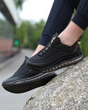 Trendy black sneakers shoes with gold air bubble effect soles for men