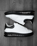 Zapatos Zapatillas blancas con suela negra con efecto burbuja de aire marca BB Salazar