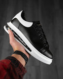 Black sneakers shoes with white sole with air bubbles effect brand BB Salazar