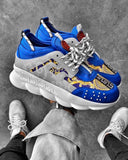 Blue basketball sneakers with gold patterns and white sole with relief effect