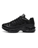 Black sneaker shoes and entirely black air bubble effect sole with men's supports