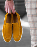 Mustard yellow suede moccasin shoes with white rubber sole for men