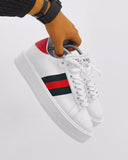 Trendy white sneaker shoes with red green stripes and thick sole for men